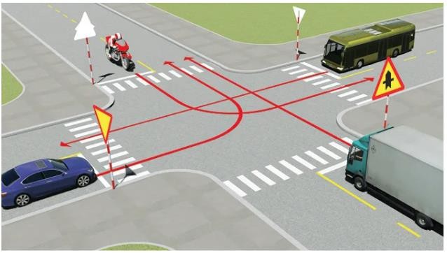  Theo hướng mũi tên, thứ tự các xe đi như thế nào là đúng quy tắc giao thông?1. Xe tải, xe khách, xe con, xe mô tô.2. Xe tải, xe mô tô, xe khách, xe con.3. Xe khách, xe tải, xe con, xe mô tô. (ảnh 1)