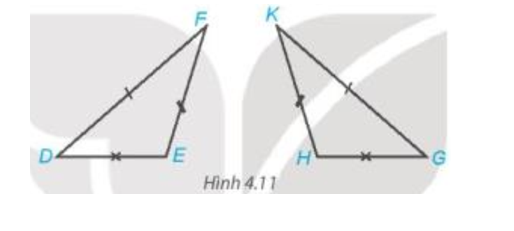 Biết hai tam giác trong Hình 4.11 bằng nhau, em hãy chỉ ra các cặp cạnh tương ứng, các cặp góc tương ứng và viết đúng kí hiệu bằng (ảnh 1)