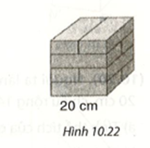 Tính diện tích xung quanh và diện tích toàn phần của khối gạch hình lập phương. (ảnh 1)