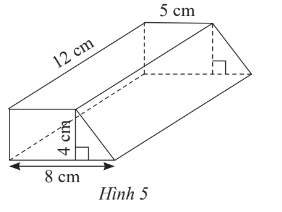 Tính thể tích lăng trụ đứng tứ giác có đáy là hình thang với kích thước cho (ảnh 1)