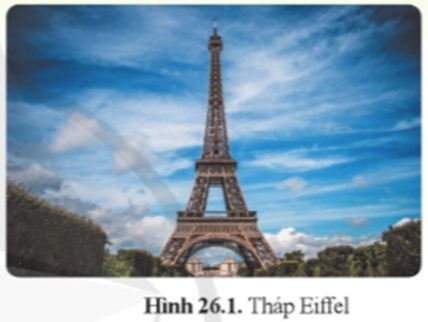 Tháp Eiffel (hình 26.1) được xây dựng tại Paris (Pa – ri) nước Pháp, là một công trình kiến trúc nổi tiếng toàn cầu. Tháp được làm bằng sắt. Khi xây xong tháp cao 325 m. (ảnh 1)