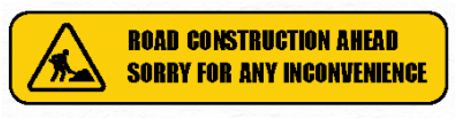 What does this notice say?   A. The road ahead is under construction. B. The road is very inconvenient.  C. The road is closed because of its inconvenience. D. We are sorry for the inconvenient road.  (ảnh 1)