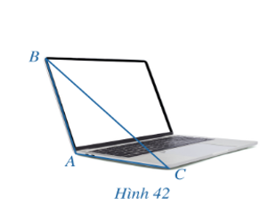 Trong Hình 42, máy tính xách tay đang mở gợi nên hình ảnh của một góc nhị diện. Ta gọi số đo góc nhị diện đó là độ (ảnh 1)