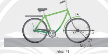 Khi xe đạp di chuyển, van \(V\)của bánh xe quay quanh trục \(O\) theo chiều kim đồng hồ với (ảnh 1)