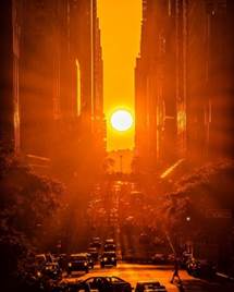 A sun setting over a city

Description automatically generated