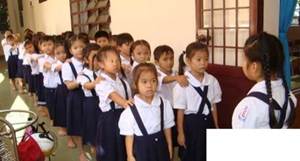 A group of children in uniform

AI-generated content may be incorrect.