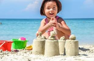 A child playing with sand
AI-generated content may be incorrect.