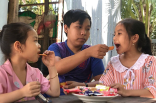 Listen and tick A, B, or C.  What shouldn’t children do at Tet? (ảnh 2)