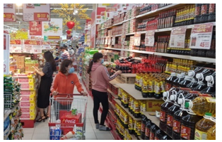 Hình ảnh dưới đây chỉ địa điểm nào?   A. chợ B. siêu thị C. thôn xóm (ảnh 1)