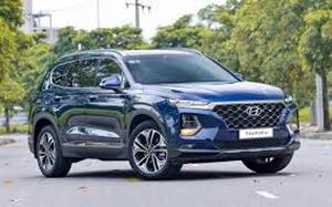 A blue car on a road

AI-generated content may be incorrect.