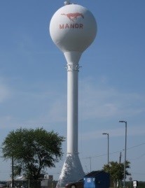 Một tháp nước có bể chứa hình cầu, đường kính bên trong của bể đo được là 6 m.  a) Tính thể tích của tháp nước đó? (ảnh 1)