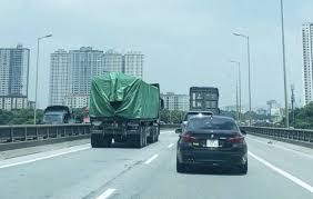 a) Thay \({E_k} = 18,m = 3\) vào (ảnh 1)