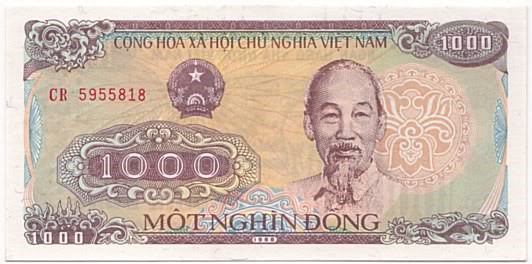 Khoanh vào chữ cái trước ý trả lời đúng. a) Tờ tiền hình bên có mệnh giá là: 	A. 1 đồng	B. 100 đồng	 	C. 2 đồng	D. 1 000 đồng (ảnh 1)