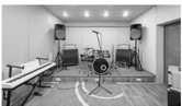 A: Is this your library?  B: No, it isn’t. It’s our music room. (ảnh 2)