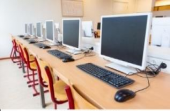 How many computer rooms are there at your school?  There is/ There are two computer rooms. (ảnh 2)